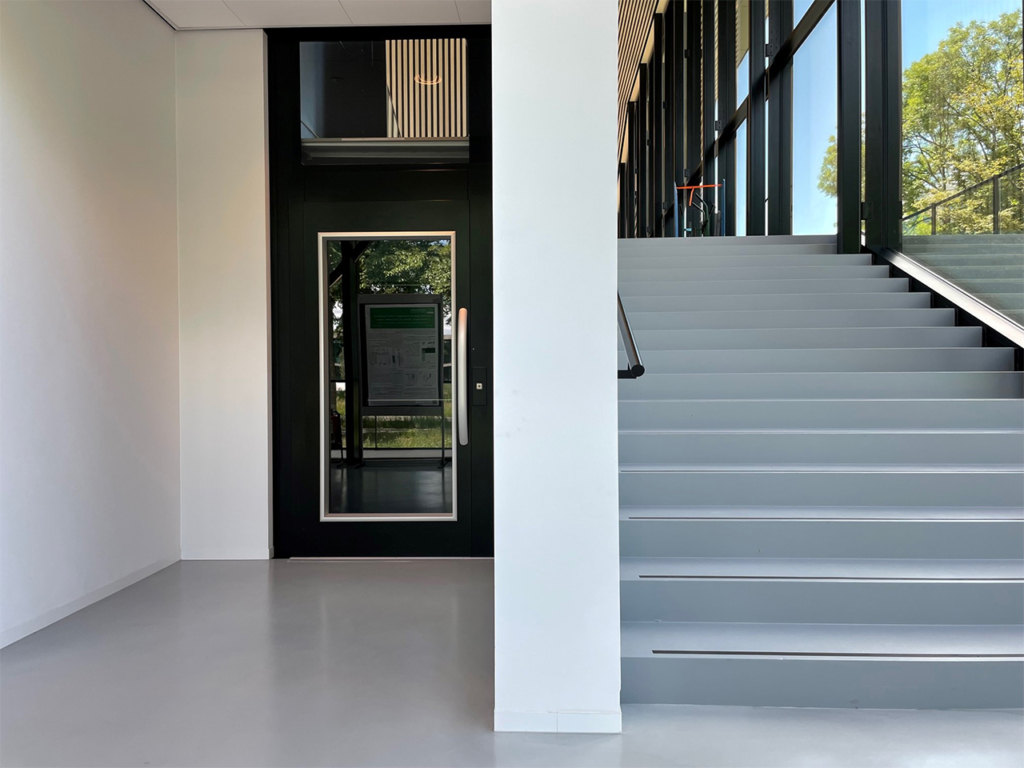 Cibes Symmetry Vertical Platform Lift installed by Elevator Service Company providing access for veterans in New England homes