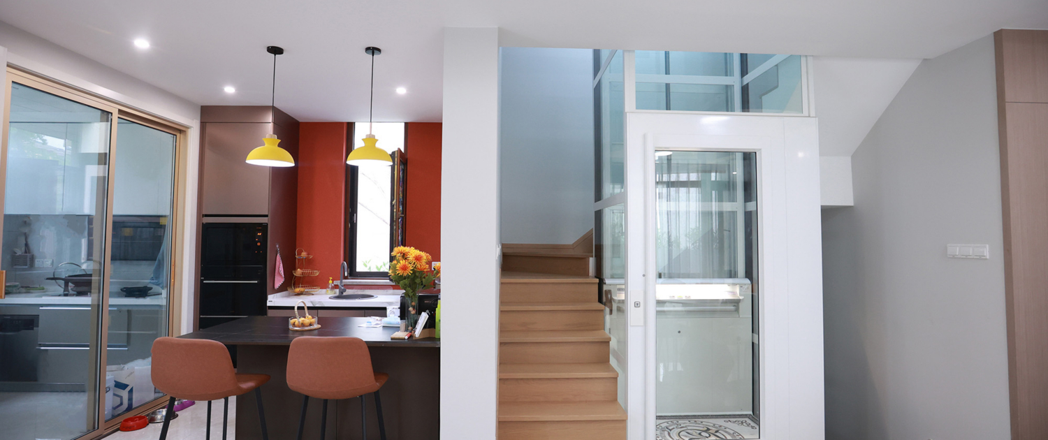 Contemporary elevator with wooden stairs in a stylish home interior.