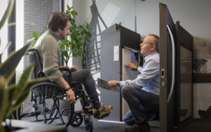 Cibes Wheelchair Lift Two Men Consulting